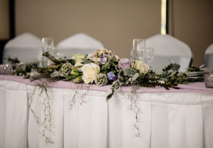 Long and Low floral display on bridal table
